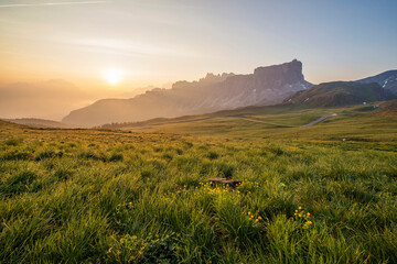 Mountain Panorama of the Dolomites as viewed from passo di Giau (as viewed from the mountain pass Giau). Photograph was taken just after the sunrise from the top of the pass.