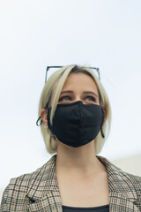 Portrait of businesswoman with protection mask