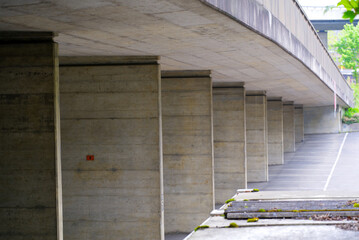 Concrete highway bridge at City of Basel on a blue cloudy spring day. Photo taken April 27th, 2022, Basel, Switzerland.