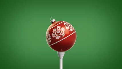 Poster Trendy Retro 3D Illustration of Shiny Red Christmas Ornament with a Snowflake Design on a Golf Tee Isolated on a Fresh Green Background © Jon Buckley