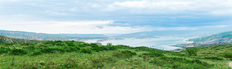Fototapeta na wymiar panorama with mountain landscape in the vicinity of the reservoir of the Chirkey hydroelectric power station in Dagestan