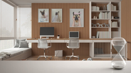 White table or shelf with crystal hourglass measuring the passing time over pet friendly home corner office, dog bed with gate, architecture interior design, copy space background