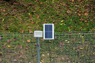 Selective focus of LED spotlight using solar power for green energy concept.