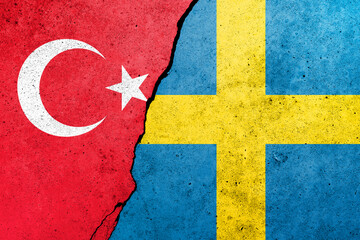 Turkey and Sweden flags painted on the concrete wall