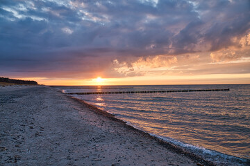 Sunset on the Baltic Sea. Sea, bean strong colors. Vacation on the beach. Landscape