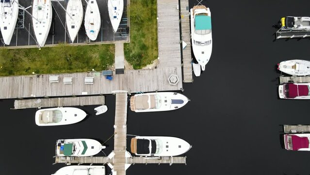 Birdseye view of boats docked in early spring.