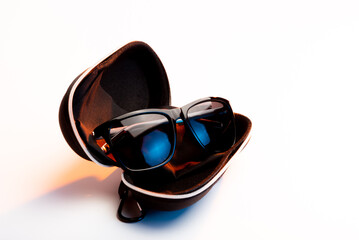 Sunglasses with protective eyeglass case