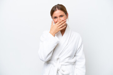 Young pretty blonde woman in bathrobe isolated on white background happy and smiling covering mouth with hand