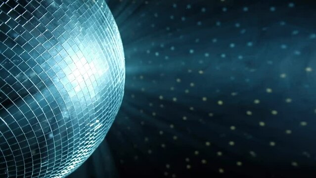 Disco ball at a party or celebration. Lighting design on the stage of the birthday party in the club. Abstract background of retro disco ball