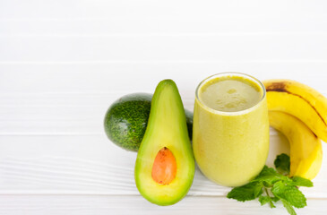 Banana mix avocado  fresh cocktail vanilla smoothies  fruit juice beverage healthy the taste yummy in glass drink episode good morning on wooden.