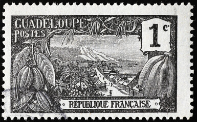 Landscape of Guadeloupe on vintage postage stamp