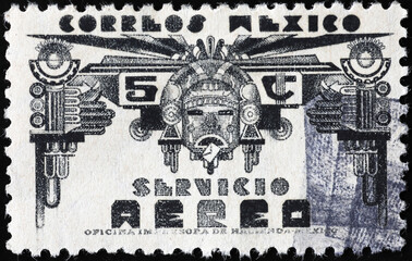 Aztec monument on vintage mexican postage stamp