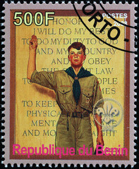 Boy scout promising to do his best on postage stamp