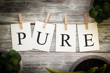 The Word PURE Concept Printed on Cards