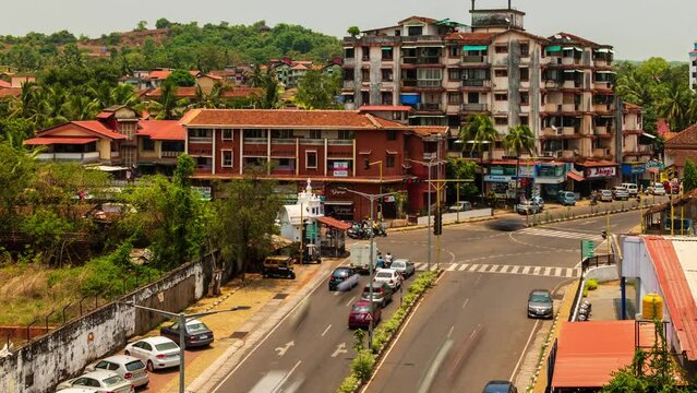 4K Timelapse footage of busy urban traffic at a junction displaying business traffic and commuters in morning or afternoon