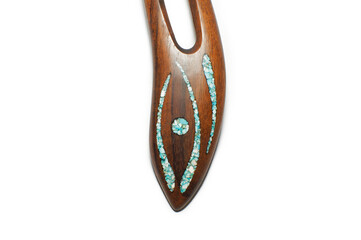 Photo of a woman's wooden hairpin on a white background. Object shooting. Content for jewelry and accessories website. A perfect gift for your girlfriend, sister or mother.