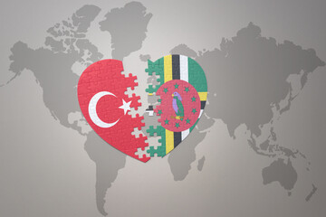 puzzle heart with the national flag of turkey and dominica on a world map background. Concept.