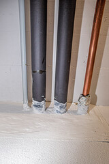 Fire barrier in a wall with cable duct.