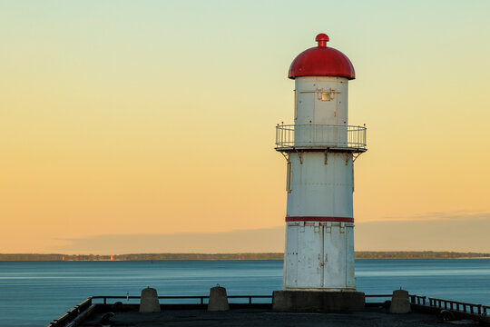 Morning sunrise over a lighthouse in Lachine Quebec