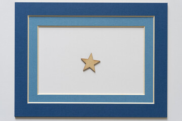 isolated star within a blue and white frame