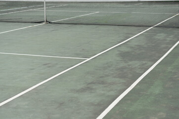community tennis court with net 