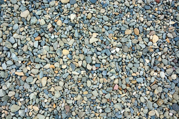 Pebbles at the sea shore- background