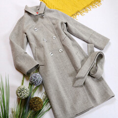 Stylish women's outfit, gray autumn coat on a white background. 