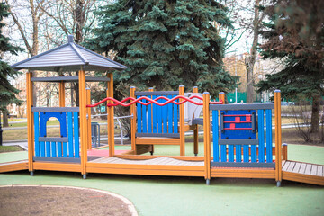 colourful playground in the park without children