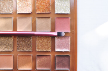 Multicolored pallete with shades for make up copy space 