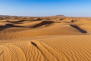 Fototapeta Pofalowany Piasek na pustynnych wydmach obraz