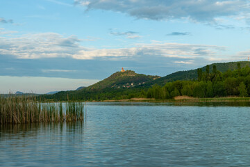 Castle on the top of the hill over the lake