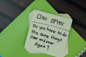 Concept of Do you have to do the same things over and over again write on a sticky notes isolated...