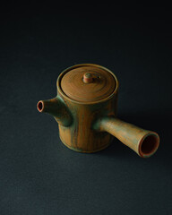 Japanese Asian style teapot, copy space, dark photo - 507380642