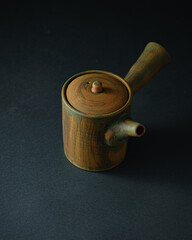 Japanese Asian style teapot, copy space, dark photo - 507380684