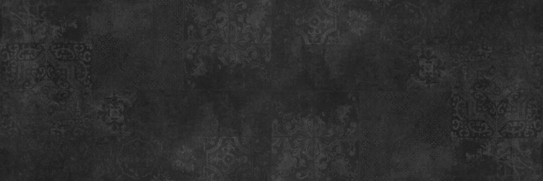 Old black gray grey vintage worn geometric shabby mosaic ornate patchwork motif porcelain stoneware tiles stone concrete cement wall texture background banner panorama
