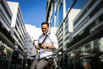 Business man looking on phone