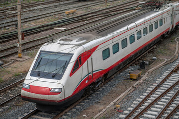 high-speed trains: a railway train ready to travel and passengers for economic and tourist...