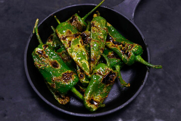 blistered padron peppers, bar, pub bite food in close up