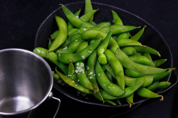 edamame beans also known as soya bean steamed in a bowl, healthy food concept