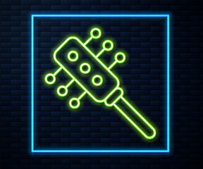 Glowing neon line Hairbrush icon isolated on brick wall background. Comb hair sign. Barber symbol. Vector