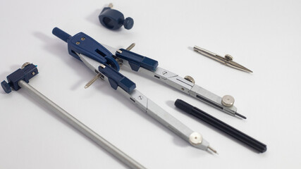 technical drawing compass on white paper with copy space