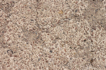 Concrete slab with stone crumbs.