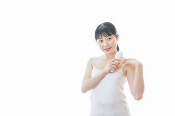 美容機器を使う若い女性