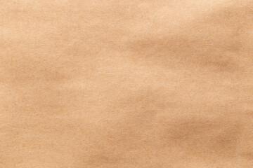 Brown eco recycled kraft paper sheet texture cardboard background.