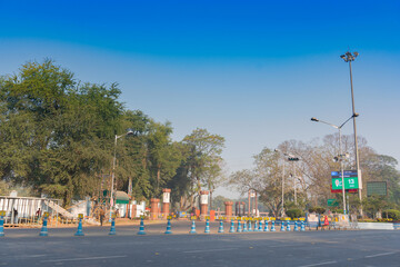 Kolkata, West Bengal, India - 23rd Jannuary 2019 : View of empty Red Road in the morning with blue...