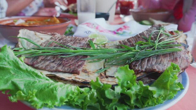 Tlayudas in half, traditional Mexican food from Oaxaca 