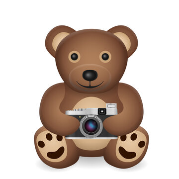 Teddy bear with photo camera
