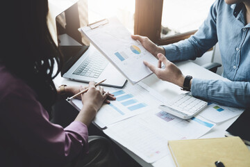 teamwork concept, consulting, portrait of male economist  holding budget papers finance and...