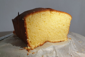 Freshly baked sponge cake on a baking paper.