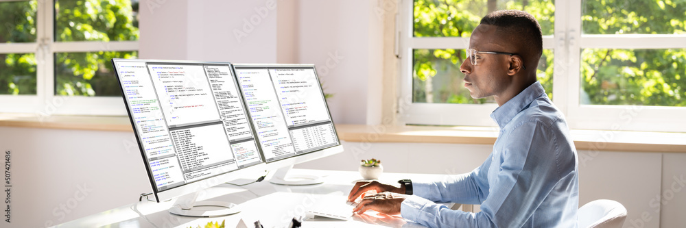 Poster African American Coder Using Computer At Desk